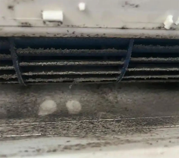 泉州市空调吹的风有股烧焦味是怎么回事